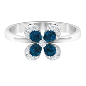 0.75 CT London Blue Topaz and Diamond Floral Ring