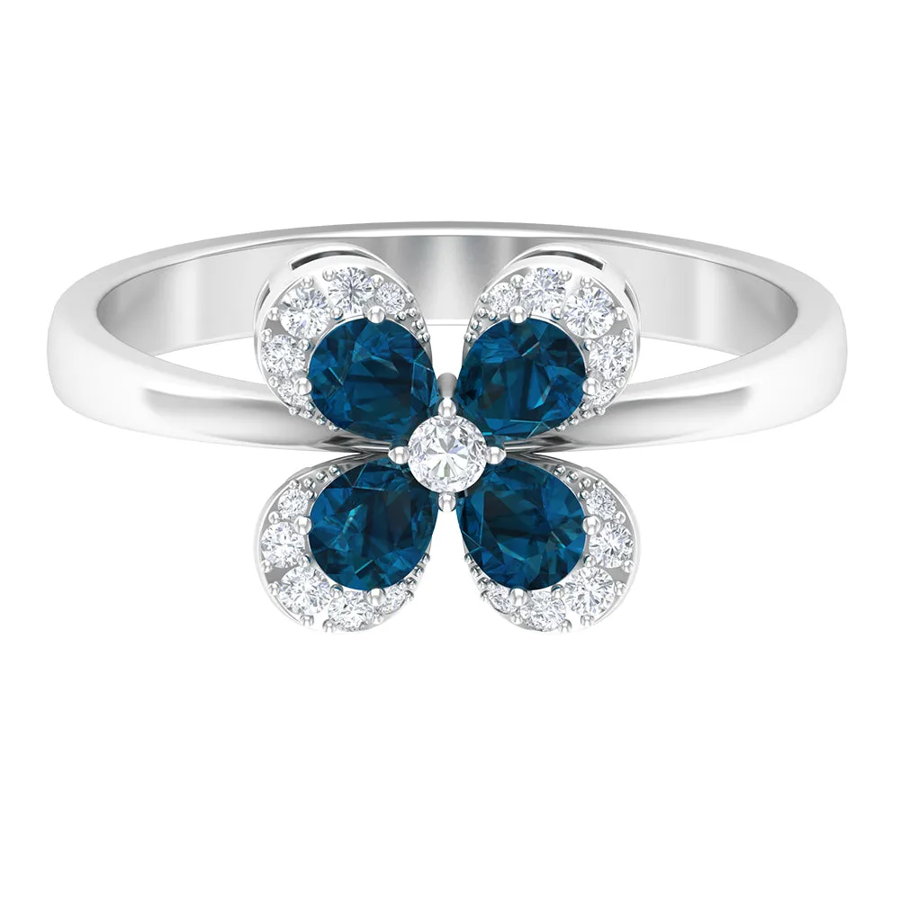 0.75 CT London Blue Topaz and Diamond Floral Ring