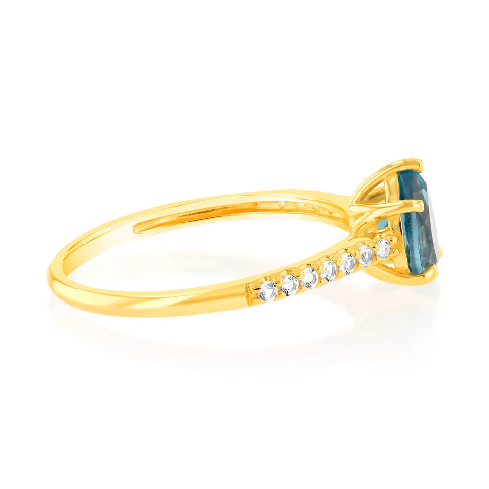 1 London Blue Topaz, 12Created Sapphire & 2 Single Cut Diamonds in 9ct Yellow Gold Ring