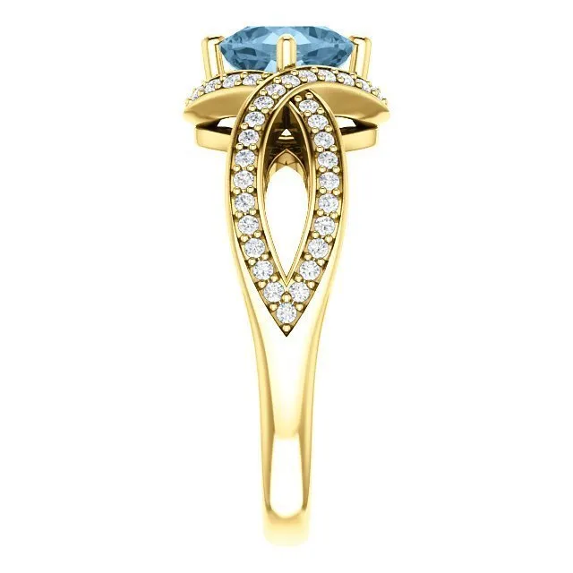 14KT GOLD 1.25 CT SKY BLUE TOPAZ & 1/3 CTW DIAMOND TWIST RING