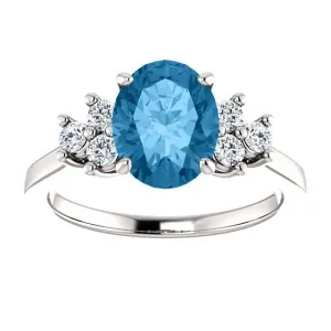 14KT GOLD 2.40 CT SWISS BLUE TOPAZ & 1/4 CTW DIAMOND ACCENT RING