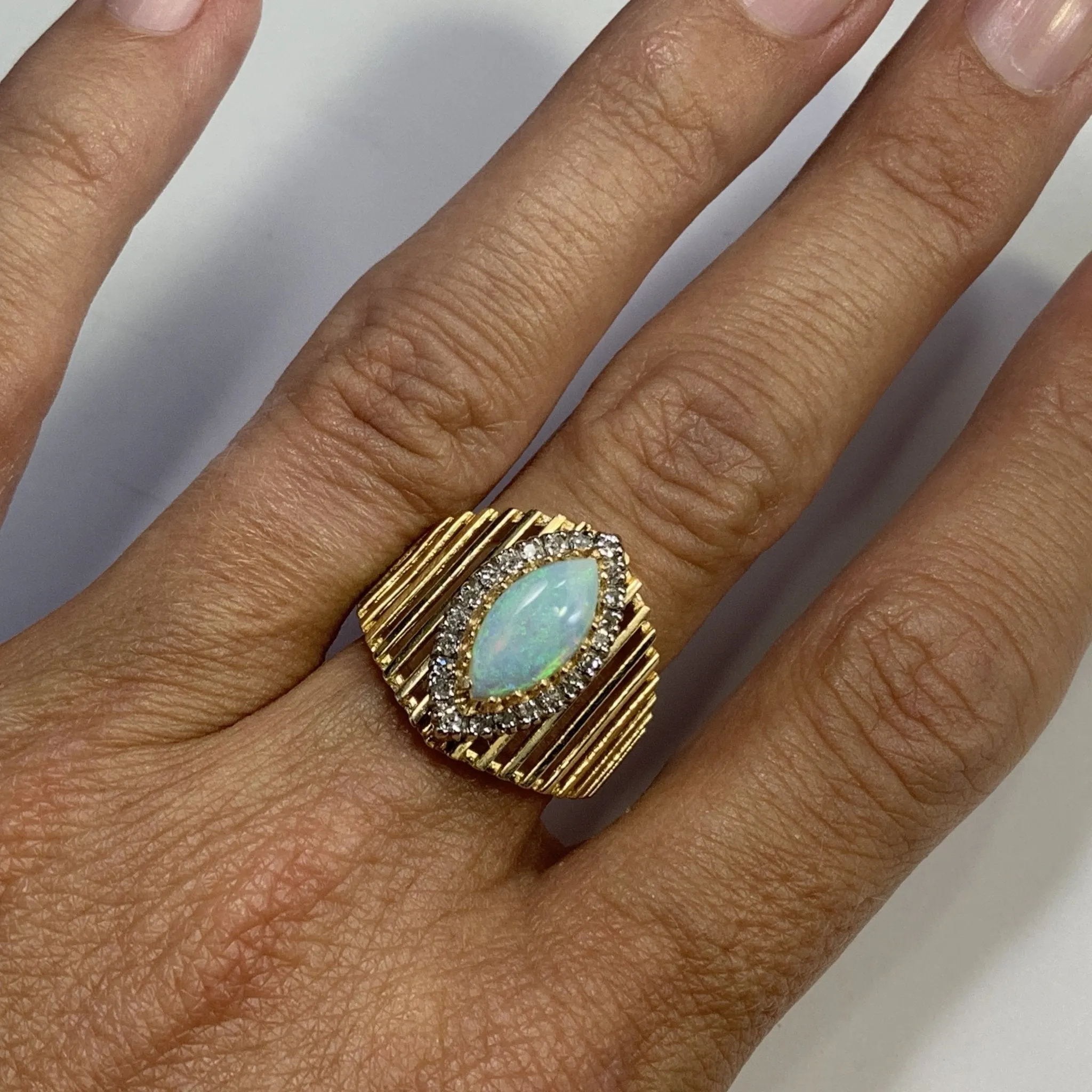 1970s Opal and Diamond Halo Statement Ring in a Large 14K Yellow Gold Setting.