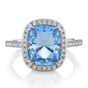 Dress ring with blue topaz simulant and 0.3 carats* of diamond simulants in sterling silver