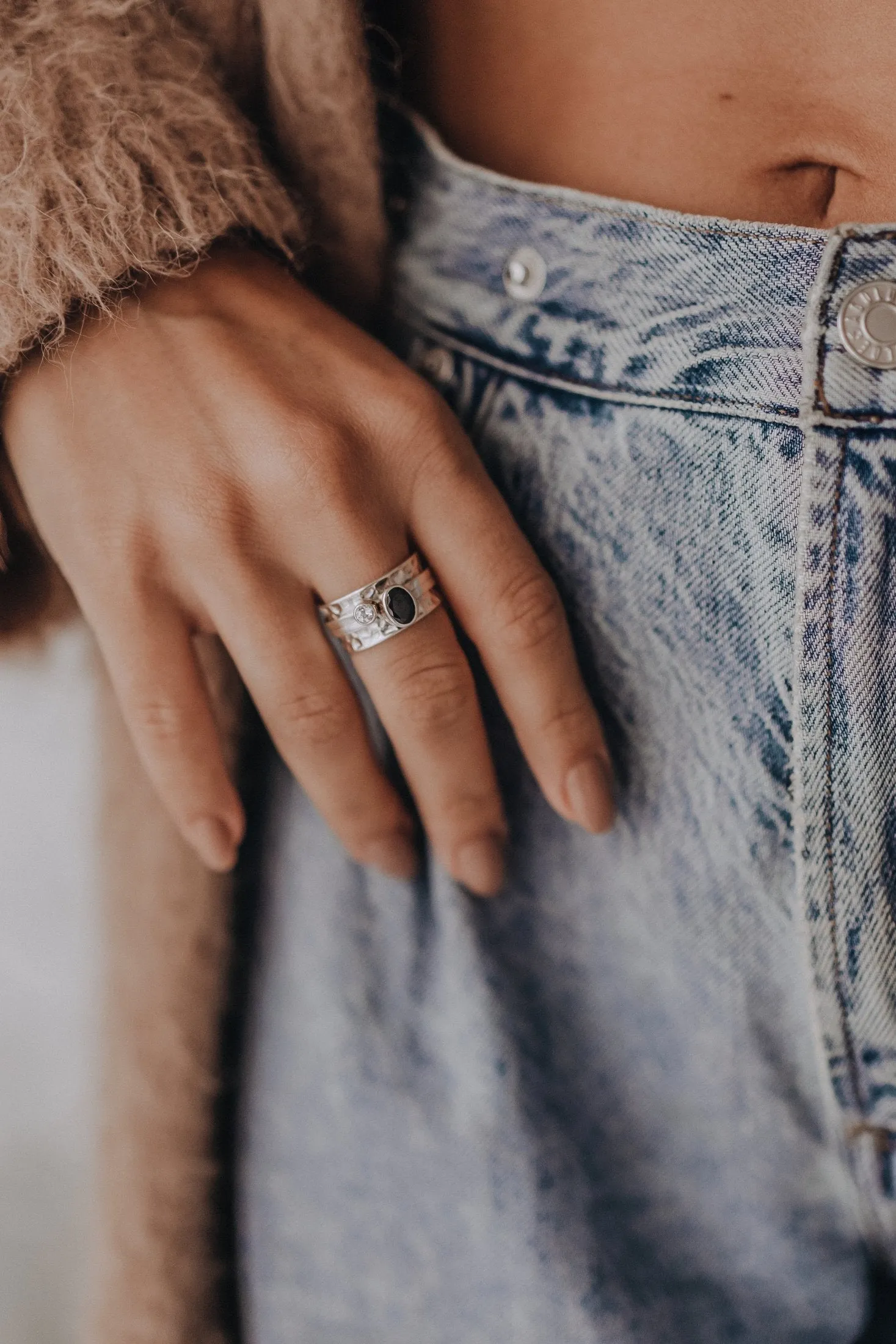 Mechanism Ring with Oval Facet Black Spinel and White Topaz