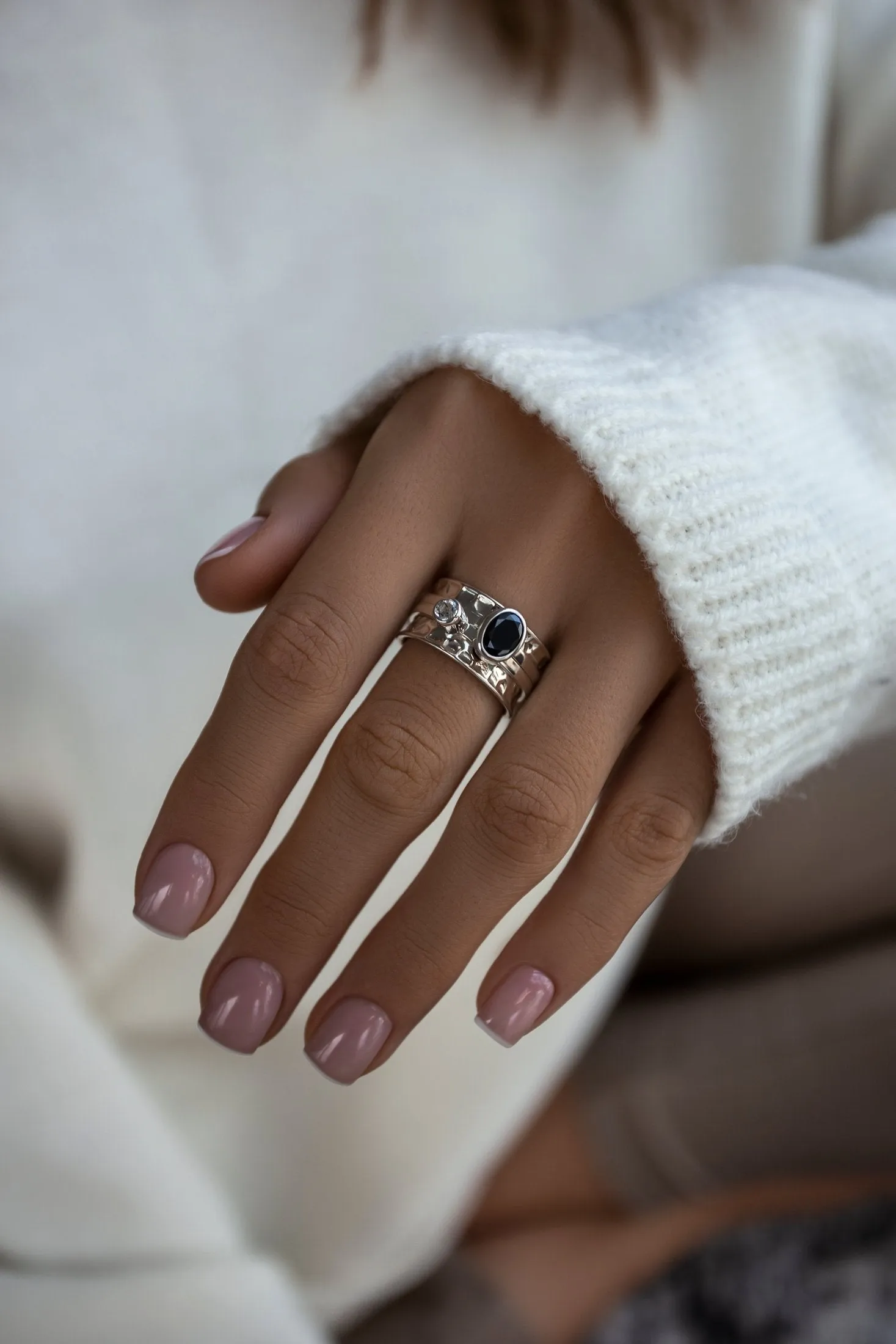 Mechanism Ring with Oval Facet Black Spinel and White Topaz