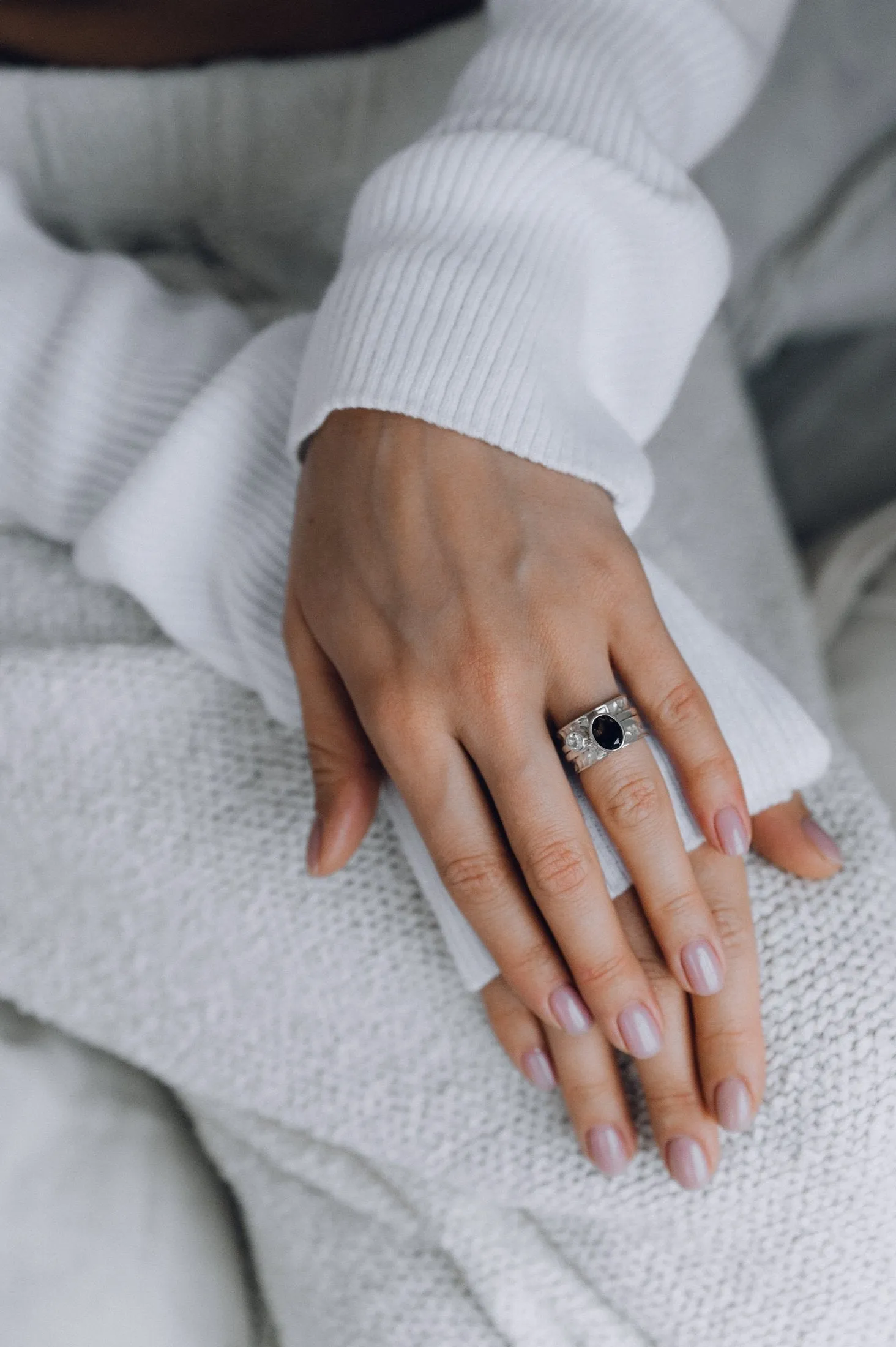 Mechanism Ring with Oval Facet Black Spinel and White Topaz