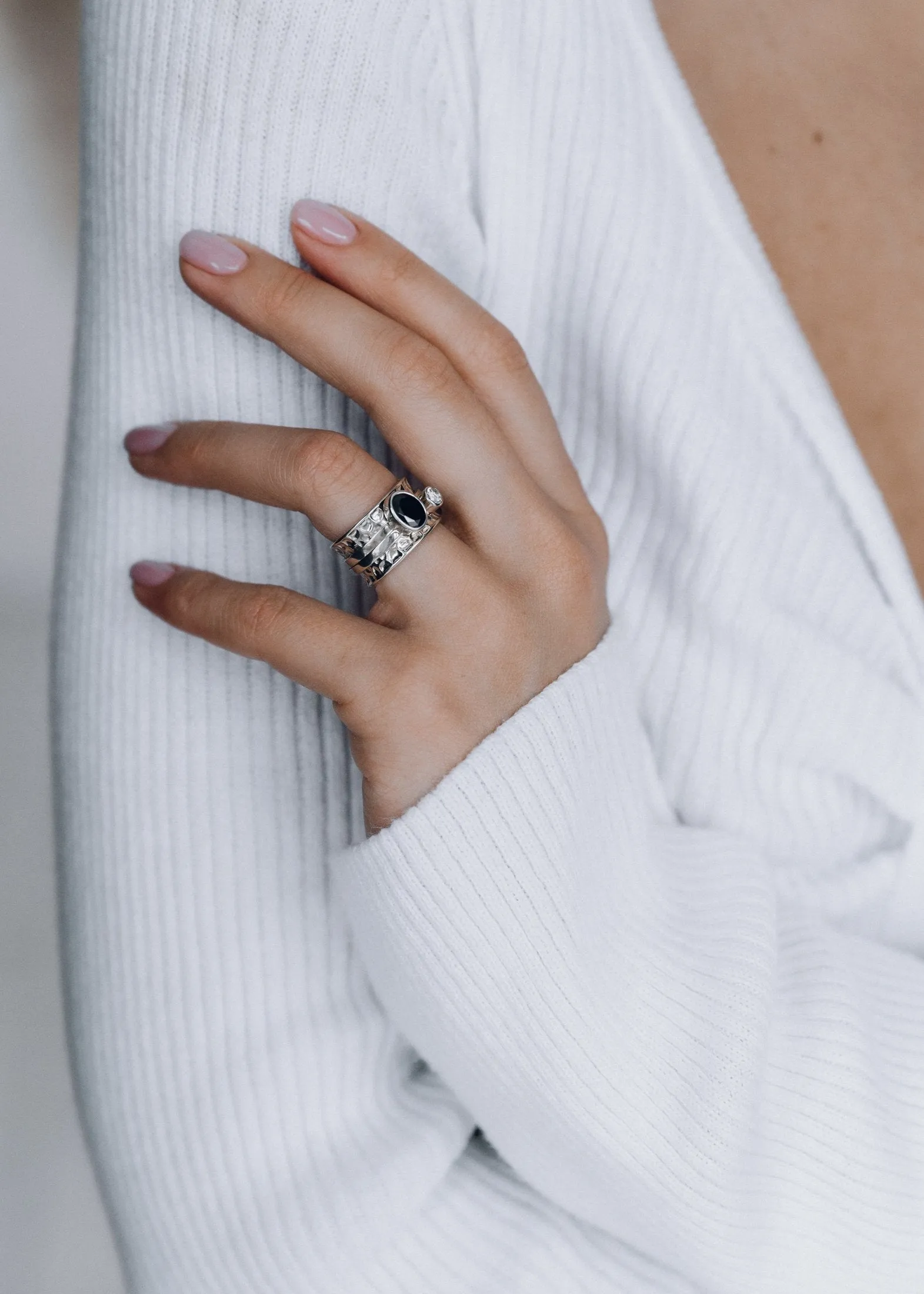 Mechanism Ring with Oval Facet Black Spinel and White Topaz