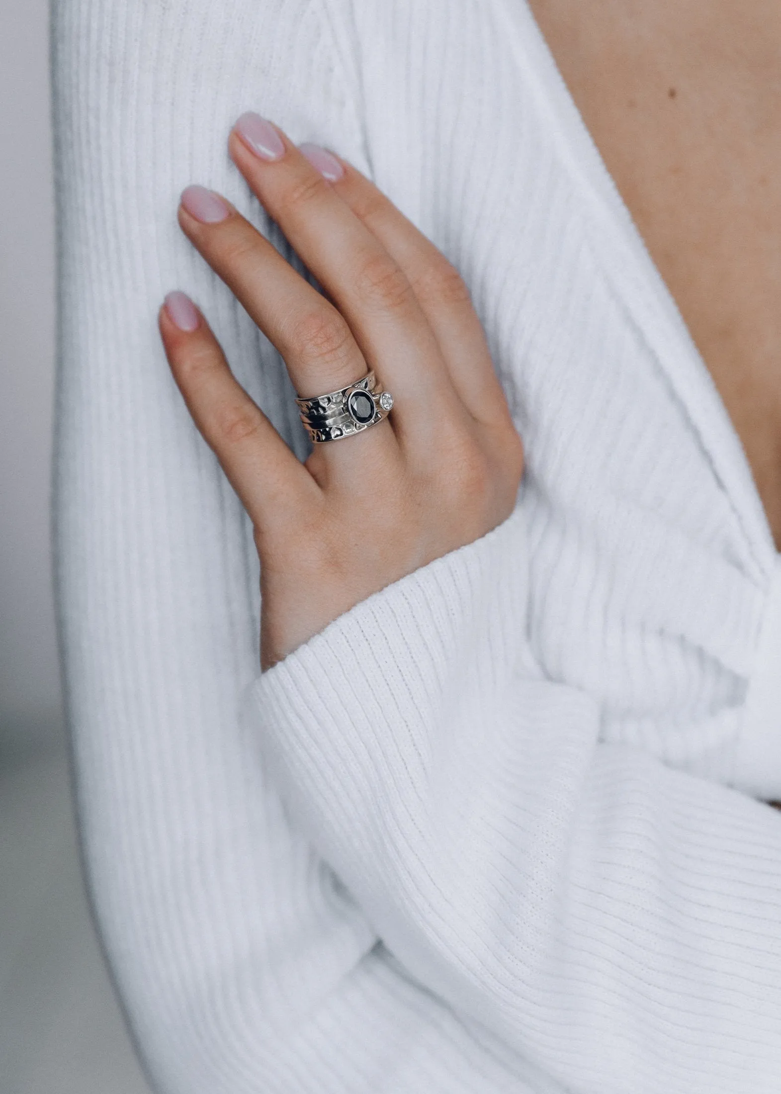 Mechanism Ring with Oval Facet Black Spinel and White Topaz